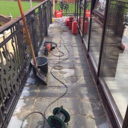Dismantling of tiles on the terrace
